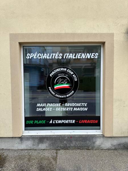 Habillage et marquage de vitrines commerciales – Neuchâtel, Vaud, Jura & Berne