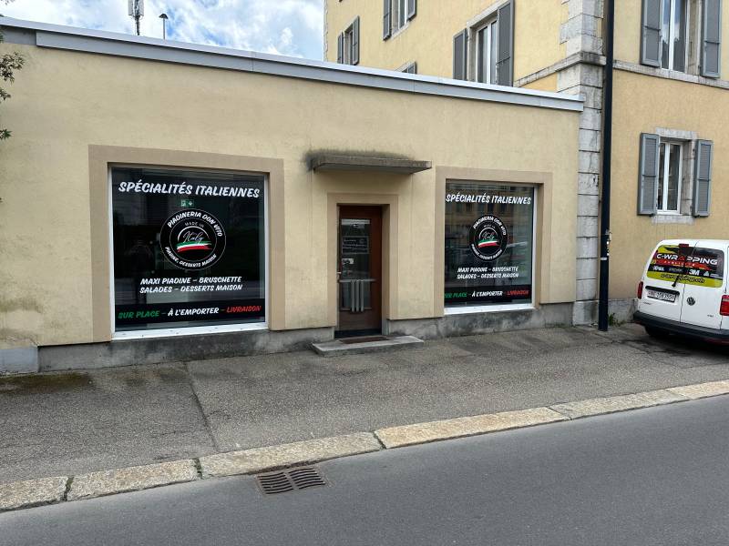 Habillage et marquage de vitrines commerciales – Neuchâtel, Vaud, Jura & Berne