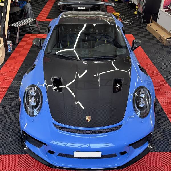 Protection de la face avant en film de protection XPel Ultimate sur une Porsche GT3 RS à la Neuveville (2520) proche de Bienne (2500) dans le canton de Berne